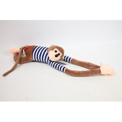  Małpa w koszulce brązowej wisząca 1008362